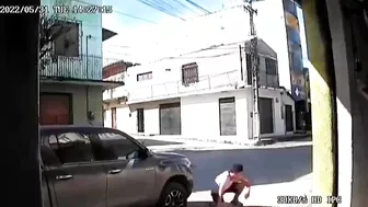 Young Man On Bicycle Escapes After Being Run Over Twice On The Road