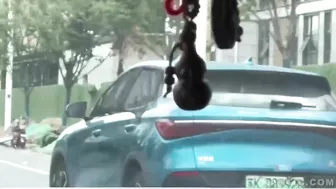 Chinese Man Rides Bicycle With Police