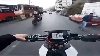 An Idiot On A Motorcycle Crashed Into A Stationary Car