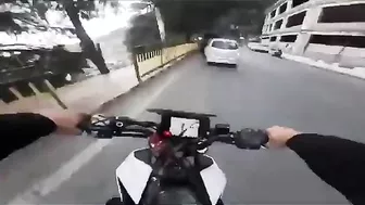 An Idiot On A Motorcycle Crashed Into A Stationary Car
