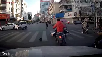 Crazy Policeman Hits Chinese Girl With Moped