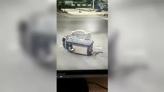 Paramedics In An Ambulance Are Seen Dumped Out On The Street With Lights Flashing After The Accident