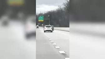 The Guy Is Completely Hanging Outside The Car