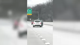 The Guy Is Completely Hanging Outside The Car