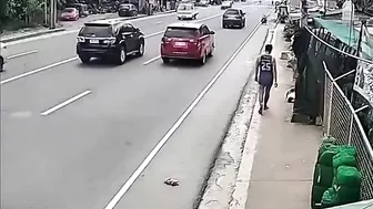 A Man Walking Casually Along The Sidewalk Becomes Part Of The Sidewalk