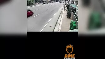 A Man Walking Casually Along The Sidewalk Becomes Part Of The Sidewalk