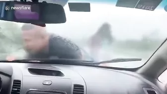 Man Clings To His Ex-wife's Car As She Drives 70 Mph On Highway