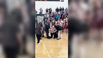 Michigan Assistant Basketball Coach And Player Threw Objects