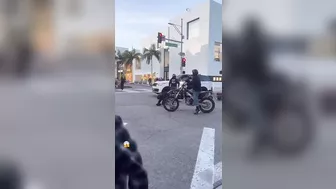 Moped Driver Ignores Red Light And Gets Rewarded