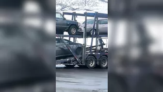 Pulling The Car Transporter Out Of The Ditch Using A Short Chain