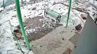 Russia: Woman Trapped Under Rubble, Nearly Run Over By Car