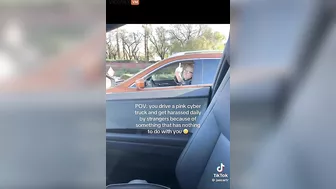 Total Loser Gives The Middle Finger To A Woman Driving A Pink Cybertruck