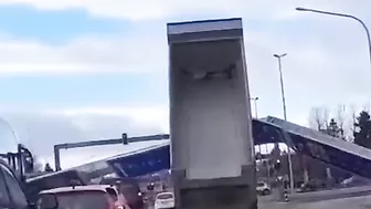 Truck Hits Huge Road Sign