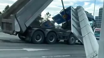Truck Hits Huge Road Sign
