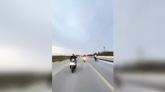 Two Cyclists Collide Violently With Oncoming Car