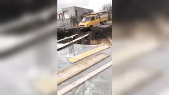Driving Over The Wooden Bridge