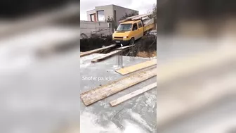 Driving Over The Wooden Bridge