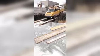 Driving Over The Wooden Bridge
